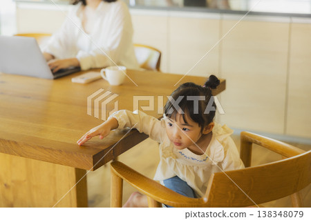 A man working from home in his living room. A man working from home in his living room. 138348079