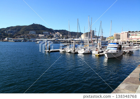 View of the central urban area of Nagasaki City, around Nagasaki Port, towards Mt. Inasa. 138348768