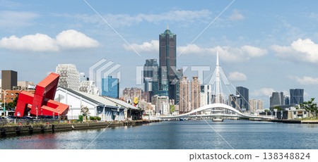Panoramic view of the Dagang Bridge, 85 Sky Tower, and other buildings. The bridge connects Pier-2 Art Center and Peng-lai Commercial Harbor in Kaohsiung, Taiwan. Panoramic view of the Dagang Bridge, 85 Sky Tower, and other buildings. The bridge connects Pier-2 Art Center and Peng-lai Commercial Harbor in Kaohsiung, Taiwan. 138348824