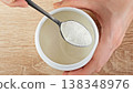 Close-up Scooping Collagen Powder From Container With Spoon. Beauty And Skincare Nutrition Supplement Concept. 138348976