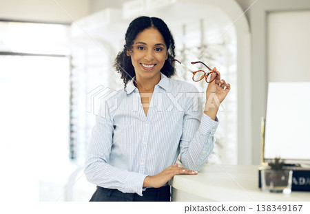 Eyeglasses, optometrist smile and portrait of woman for vision healthcare, prescription product sales or optometry. Optical glasses, retail and optician with lens frame, eyesight support or eyewear 138349167