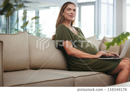 Portrait, freelance and pregnant woman with laptop on a sofa typing, search or reading at home. Maternity leave, face and female remote worker online in living room with social media, web or internet 138349176
