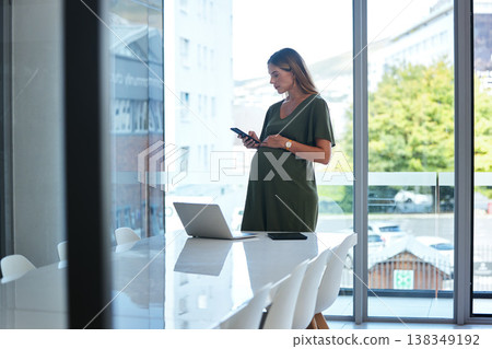 Phone, networking or pregnant woman in office on social media, website or internet to relax on break. Maternity, technology or calm female designer with pregnancy or mobile app to scroll in workplace 138349192