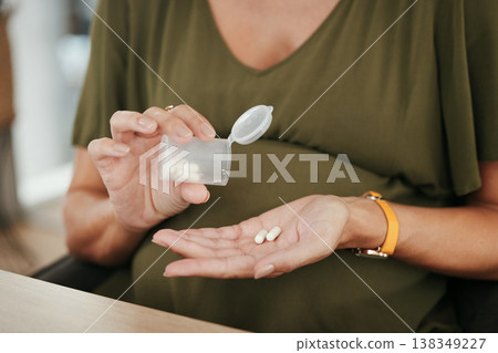 Pills in hand, pregnant woman with health and supplement for baby, prescription and prenatal vitamins. Medicine in container, healthcare and pharmaceutical drugs for healthy pregnancy with iron Pills in hand, pregnant woman with health and supplement for baby, prescription and prenatal vitamins. Medicine in container, healthcare and pharmaceutical drugs for healthy pregnancy with iron 138349227