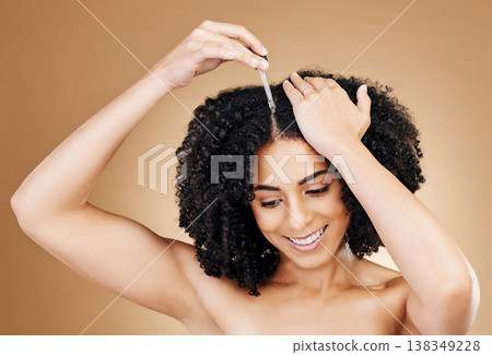 Woman, oil for hair and natural curls with shine and beauty, salon treatment and strong texture on studio brown background. Serum, liquid collagen for growth and haircare, cosmetic product or dropper 138349228