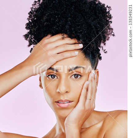 Skincare, beauty and woman with makeup for cosmetic aesthetic isolated in studio pink background for wellness. Hands on face, glow and young person with dermatology facial treatment for smooth skin 138349231