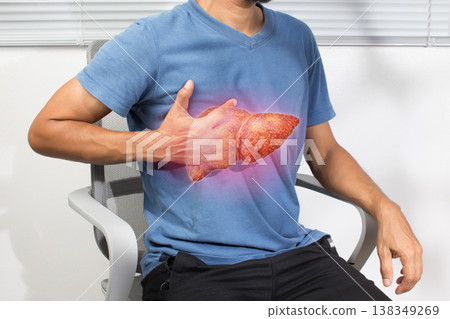 Man with liver cirrhosis or fatty liver showing symptoms and health complications Man with liver cirrhosis or fatty liver showing symptoms and health complications 138349269