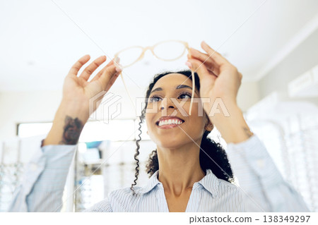 Optometry store, glasses and happy woman check lens frame quality, retail shop choice or eyewear accessory. Eye care product, vision support and shopping client, customer and analysis of eyeglasses Optometry store, glasses and happy woman check lens frame quality, retail shop choice or eyewear accessory. Eye care product, vision support and shopping client, customer and analysis of eyeglasses 138349297