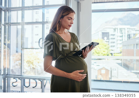 Tablet, online and pregnant business woman in office reading information on internet. Maternity, research and female designer from Canada with pregnancy working on digital technology in workplace. 138349355