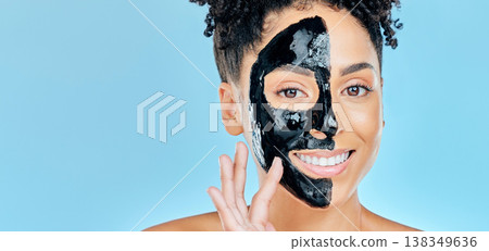 Skincare, charcoal mask and portrait of happy woman for facial treatment, spa and wellness in studio. Beauty, dermatology and face of person for health, cosmetics and grooming on blue background 138349636