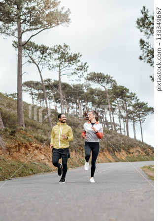 Running, smile and fitness with couple in nature for workout partner, bonding and health. Exercise club, runner practice and wellness with man and woman outdoor for training and cardio challenge Running, smile and fitness with couple in nature for workout partner, bonding and health. Exercise club, runner practice and wellness with man and woman outdoor for training and cardio challenge 138349667