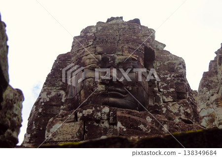 The faces of the stone statues at the Bayon Temple, a UNESCO World Heritage Site in Cambodia The faces of the stone statues at the Bayon Temple, a UNESCO World Heritage Site in Cambodia 138349684
