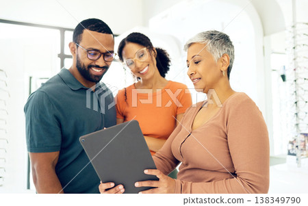 Eye test results, talking and woman with a couple, glasses and a tablet for online information. Optometry, happy and a man and woman with an optometrist and technology for vision and eyewear shopping Eye test results, talking and woman with a couple, glasses and a tablet for online information. Optometry, happy and a man and woman with an optometrist and technology for vision and eyewear shopping 138349790