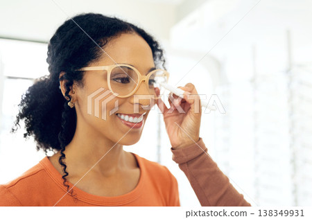 Hand, marker and optometrist writing on glasses of woman for prescription lens, frame or shopping in store. Smile, optician and measure pupils on spectacles, eye health or vision exam in consultation Hand, marker and optometrist writing on glasses of woman for prescription lens, frame or shopping in store. Smile, optician and measure pupils on spectacles, eye health or vision exam in consultation 138349931