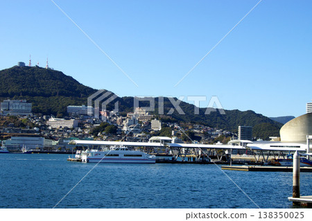 View of the central urban area of Nagasaki City, around Nagasaki Port, towards Mt. Inasa. 138350025