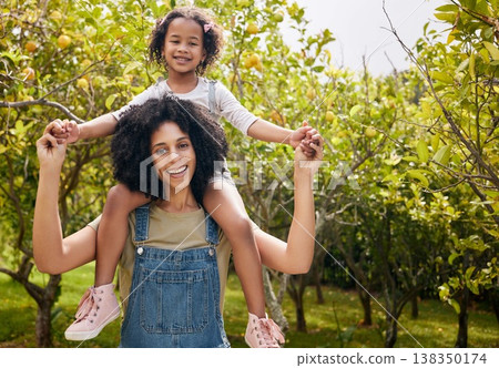 Mother with kid, orchard and portrait, piggyback in nature and agriculture with healthy food and nutrition on farm. Farmer, woman and daughter time picking citrus fruit with lemon harvest and bonding Mother with kid, orchard and portrait, piggyback in nature and agriculture with healthy food and nutrition on farm. Farmer, woman and daughter time picking citrus fruit with lemon harvest and bonding 138350174