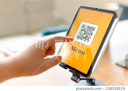 Scan QR codes with a tablet 138350519