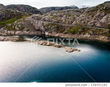 Road and lakes in mountains Norway Road and lakes in mountains Norway 138351181