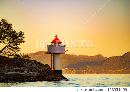 Lighthouse on coast in Norway 138351469