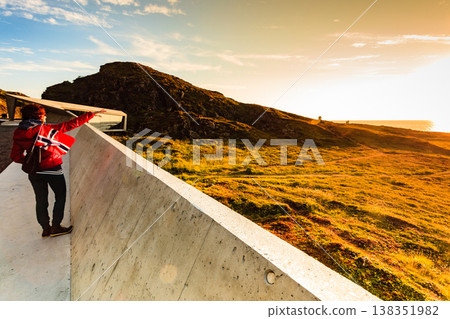 Andoya island sea coast and tourist with norwegian flag Andoya island sea coast and tourist with norwegian flag 138351982
