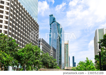 A cityscape with greenery and buildings A cityscape with greenery and buildings 138352189