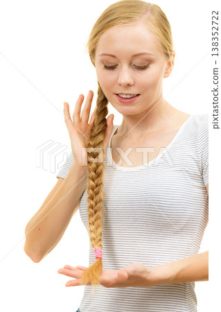 Blonde young woman with braid hair Blonde young woman with braid hair 138352722