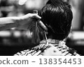 Experienced Barbering Showcasing Detailed Necklines And Textured Hair In Monochrome Aesthetic 138354453