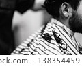 Client Receiving Careful Trim. Barber Delivering Meticulous And Exact Hairstyle Transformation Today 138354459