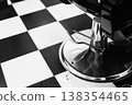 Studio Shot Showcasing Mirrored Chrome Finishes Alongside Intricately Patterned Tiles In Monochrome Style 138354465