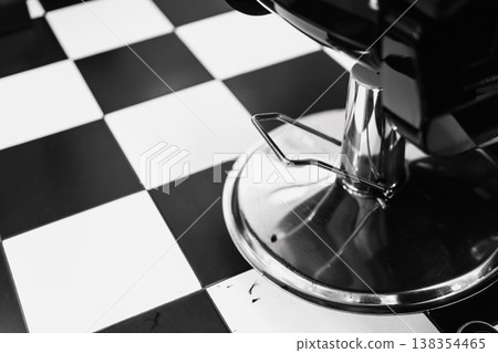 Studio Shot Showcasing Mirrored Chrome Finishes Alongside Intricately Patterned Tiles In Monochrome Style 138354465