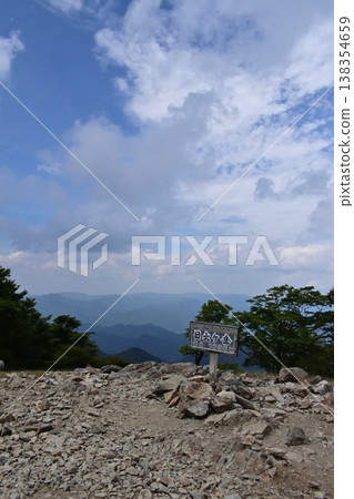 View of Mt. Hidenogatake, the highest peak of the Odaigahara Mountains, one of Japan's 100 Famous Mountains, in Mie Prefecture. View of Mt. Hidenogatake, the highest peak of the Odaigahara Mountains, one of Japan's 100 Famous Mountains, in Mie Prefecture. 138354659