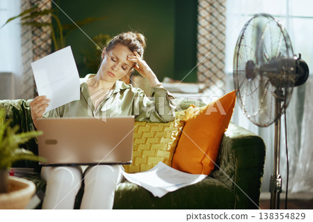 Stressed Woman Combating Heat & Work Fatigue 138354829