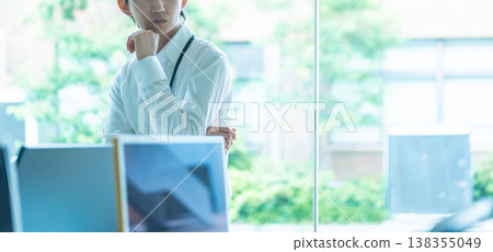 Thinking office worker Thinking office worker 138355049