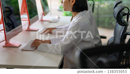 Researchers working on PCs 138355053