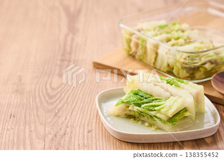 Steamed pork belly and napa cabbage, served as a portion of home-style cooking. Steamed pork belly and napa cabbage, served as a portion of home-style cooking. 138355452