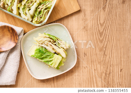 Steamed pork belly and napa cabbage, served as a portion of home-style cooking. 138355455