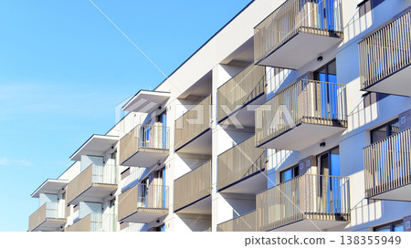 Apartments in residential complex. Housing structure at modern house.  Architecture for property investment. and architecture details. Urban abstract - windows of apartment building. 138355949