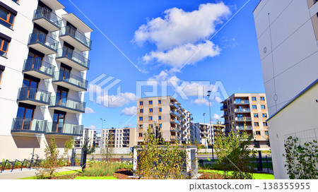 Apartments in residential complex. Housing structure at modern house. Architecture for property investment. and architecture details. Urban abstract - windows of apartment building. Apartments in residential complex. Housing structure at modern house. Architecture for property investment. and architecture details. Urban abstract - windows of apartment building. 138355955