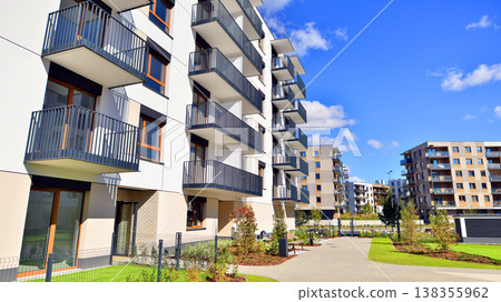 Apartments in residential complex. Housing structure at modern house. Architecture for property investment. and architecture details. Urban abstract - windows of apartment building. Apartments in residential complex. Housing structure at modern house. Architecture for property investment. and architecture details. Urban abstract - windows of apartment building. 138355962