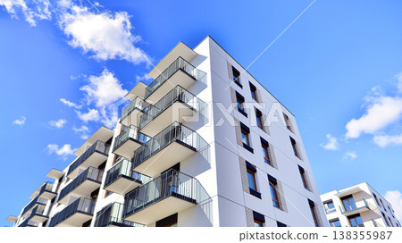 Apartments in residential complex. Housing structure at modern house. Architecture for property investment. and architecture details. Urban abstract - windows of apartment building. Apartments in residential complex. Housing structure at modern house. Architecture for property investment. and architecture details. Urban abstract - windows of apartment building. 138355987