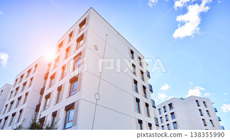 Apartments in residential complex. Housing structure at modern house.  Architecture for property investment. and architecture details. Urban abstract - windows of apartment building. 138355990