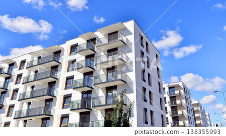 Apartments in residential complex. Housing structure at modern house. Architecture for property investment. and architecture details. Urban abstract - windows of apartment building. Apartments in residential complex. Housing structure at modern house. Architecture for property investment. and architecture details. Urban abstract - windows of apartment building. 138355993