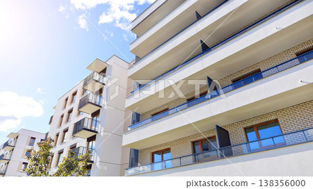 Apartments in residential complex. Housing structure at modern house. Architecture for property investment. and architecture details. Urban abstract - windows of apartment building. Apartments in residential complex. Housing structure at modern house. Architecture for property investment. and architecture details. Urban abstract - windows of apartment building. 138356000