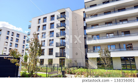 Apartments in residential complex. Housing structure at modern house. Architecture for property investment. and architecture details. Urban abstract - windows of apartment building. Apartments in residential complex. Housing structure at modern house. Architecture for property investment. and architecture details. Urban abstract - windows of apartment building. 138356001