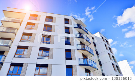 Apartments in residential complex. Housing structure at modern house. Architecture for property investment. and architecture details. Urban abstract - windows of apartment building. Apartments in residential complex. Housing structure at modern house. Architecture for property investment. and architecture details. Urban abstract - windows of apartment building. 138356013