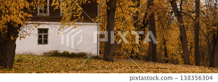 Banner Serene Rural House With Autumn Foliage. Idyllic Rustic Cottage Amid Vibrant Autumn Trees Banner Serene Rural House With Autumn Foliage. Idyllic Rustic Cottage Amid Vibrant Autumn Trees 138356304