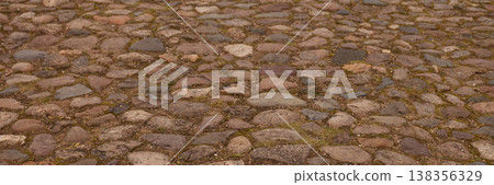 Banner Historic Street Surface With Moss Patches. Textured Cobblestone Path Highlighting Weathered Urban Banner Historic Street Surface With Moss Patches. Textured Cobblestone Path Highlighting Weathered Urban 138356329