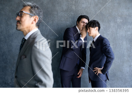 Japanese men gossiping about their bosses Japanese men gossiping about their bosses 138356395