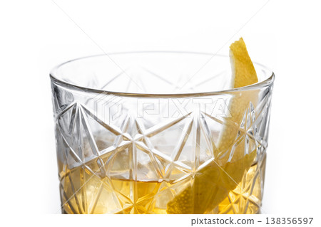 Rusty Nail Cocktail with Lemon Peel in Crystal Glass Rusty Nail Cocktail with Lemon Peel in Crystal Glass 138356597