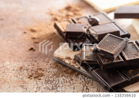 Assortment of white, milk and dark chocolate pieces Assortment of white, milk and dark chocolate pieces 138356610